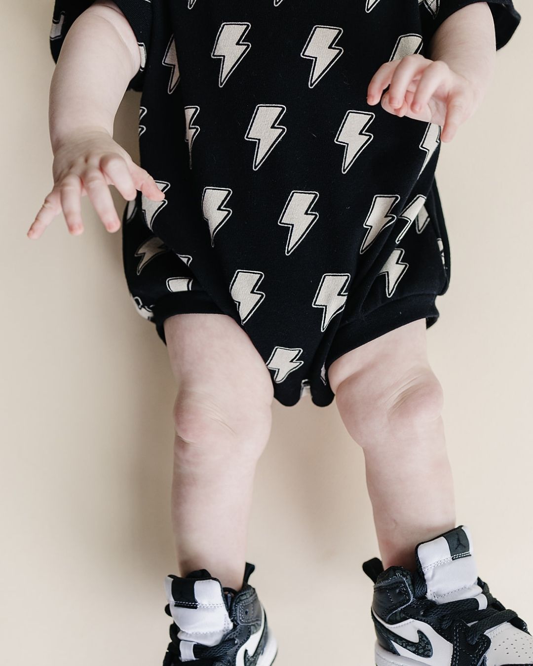 LPK Short Sleeve Bubble Romper - Black Bolts - Atara & Co