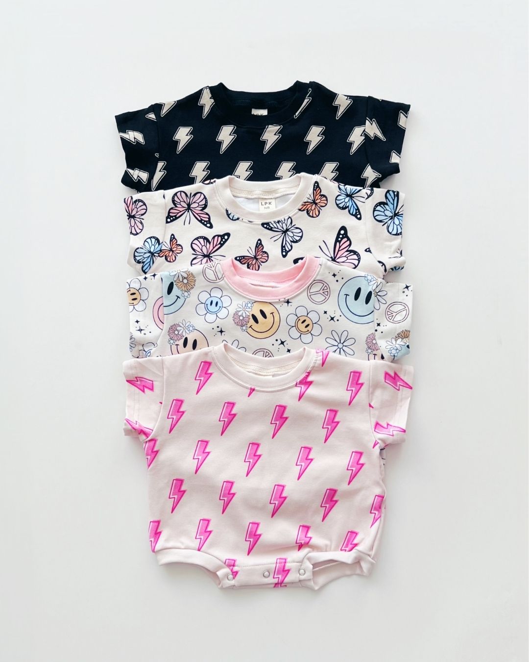 LPK Short Sleeve Bubble Romper - Pink Bolts - Atara & Co