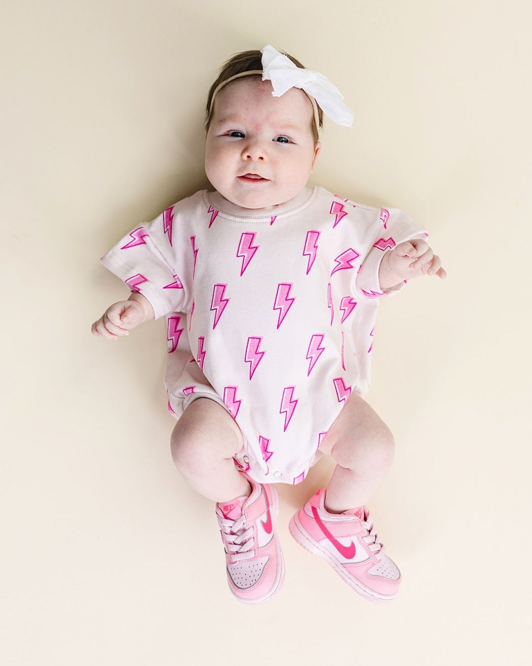 LPK Short Sleeve Bubble Romper - Pink Bolts - Atara & Co