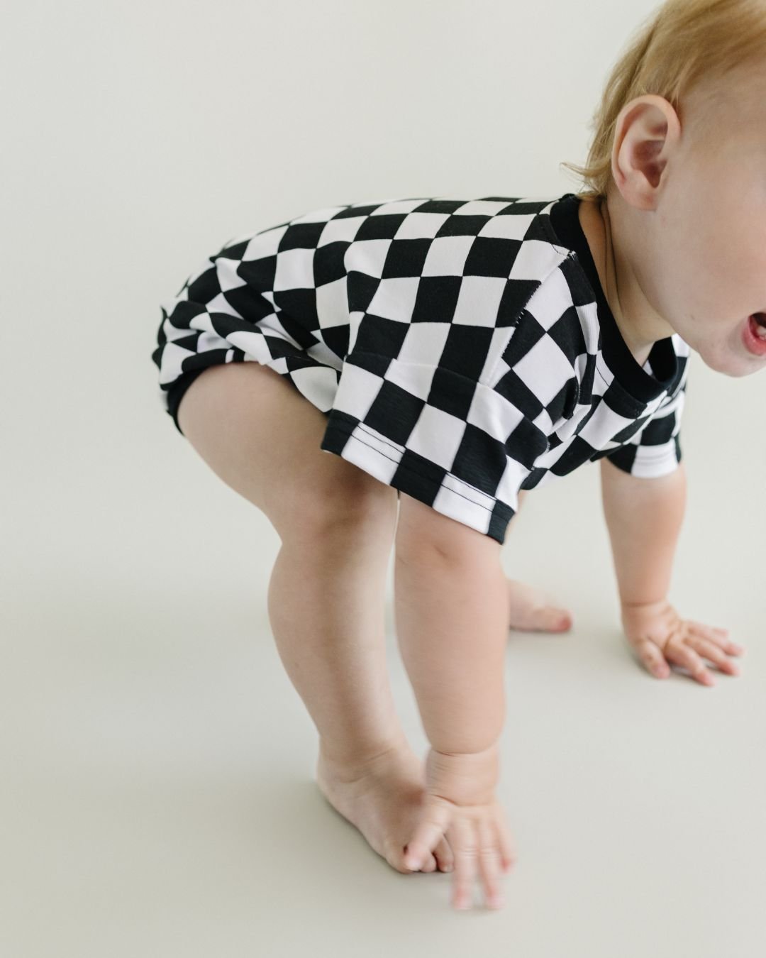 LPK Short Sleeve Bubble Romper - Checkered Smiley Black - Atara & Co