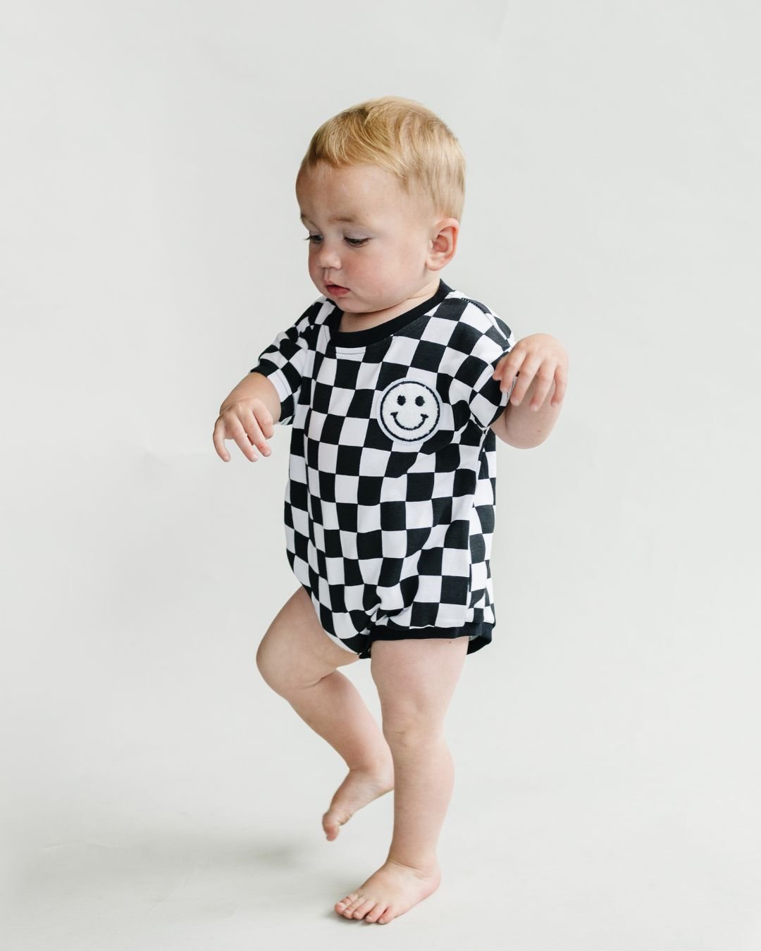 LPK Short Sleeve Bubble Romper - Checkered Smiley Black - Atara & Co