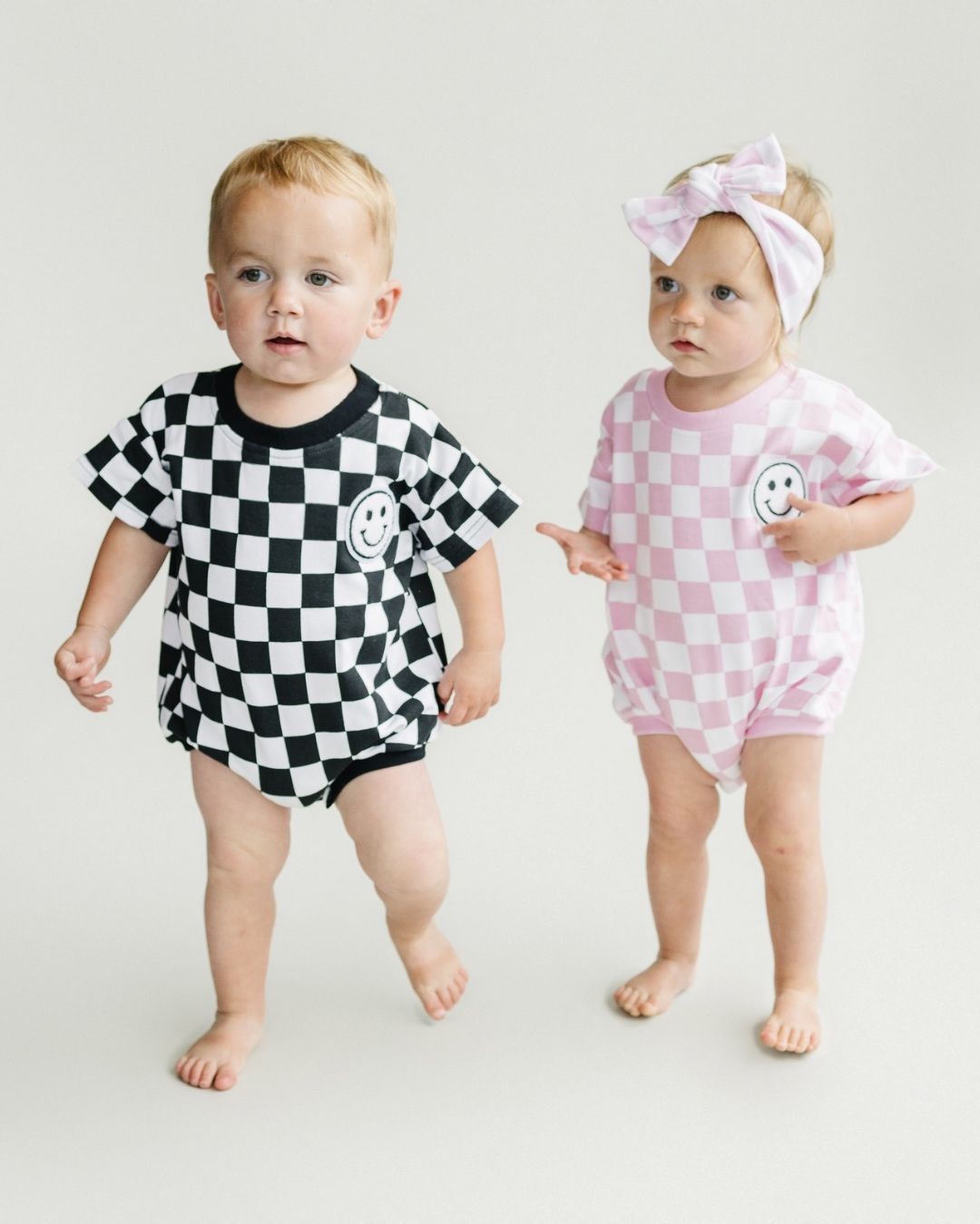 LPK Short Sleeve Bubble Romper - Checkered Smiley Black - Atara & Co