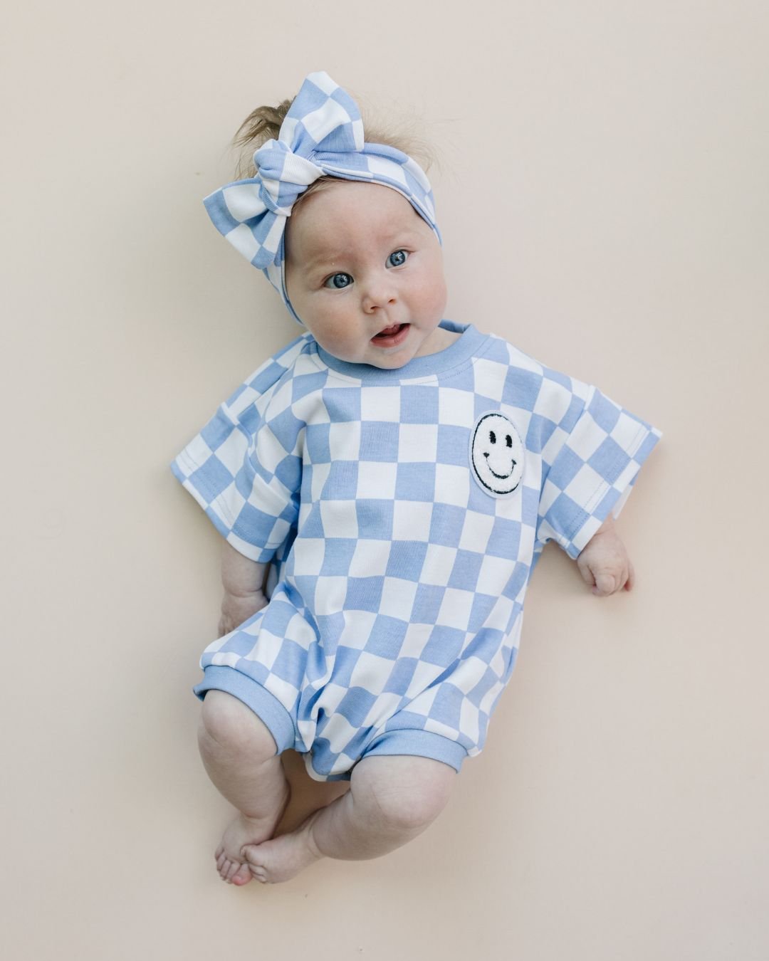 LPK Short Sleeve Bubble Romper - Checkered Smiley Blue - Atara & Co