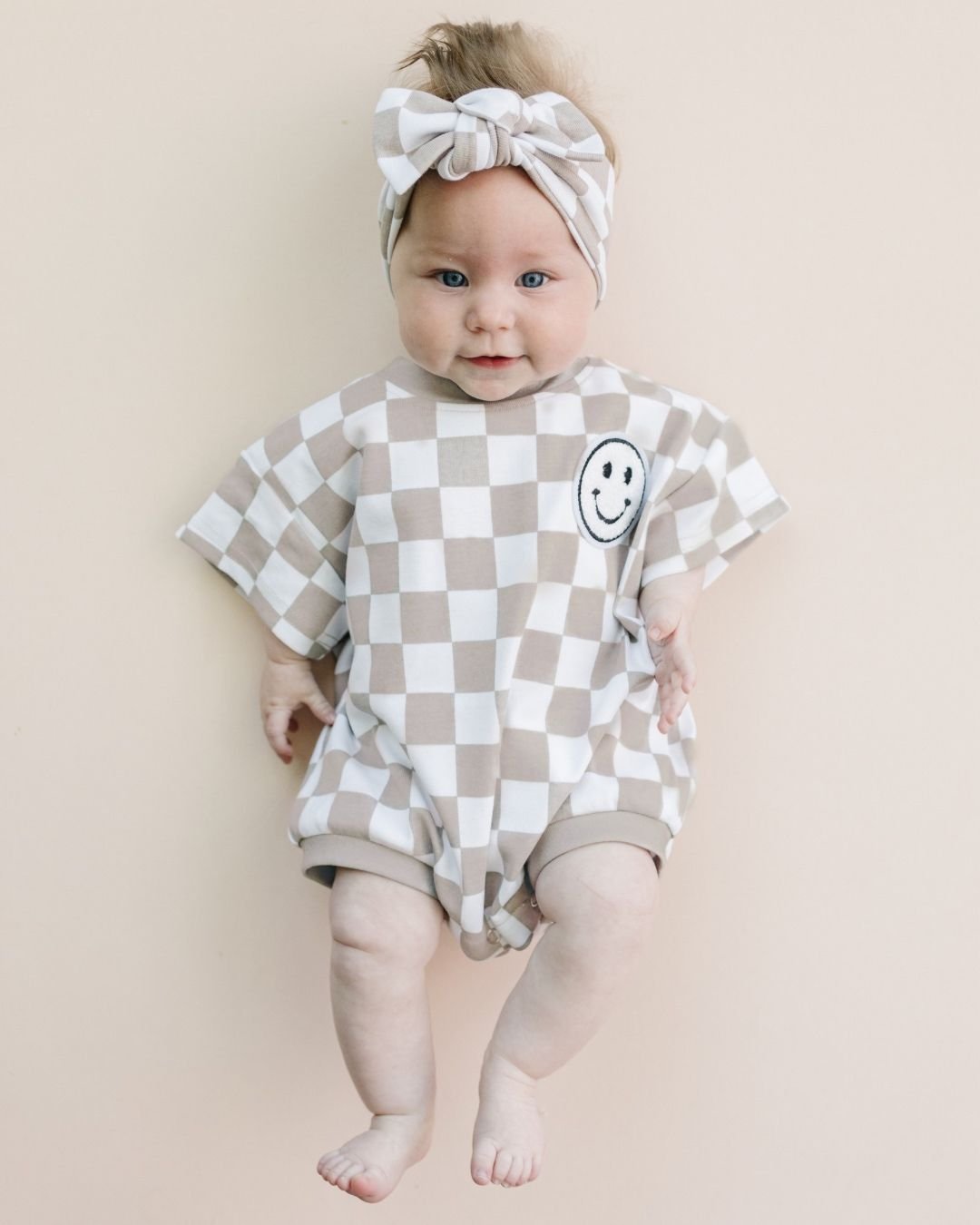 LPK Short Sleeve Bubble Romper - Checkered Smiley Latte - Atara & Co