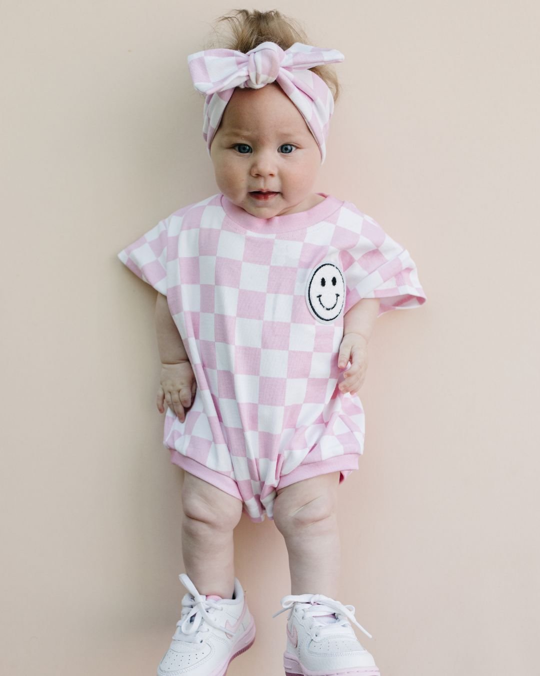 LPK Short Sleeve Bubble Romper - Checkered Smiley Pink - Atara & Co