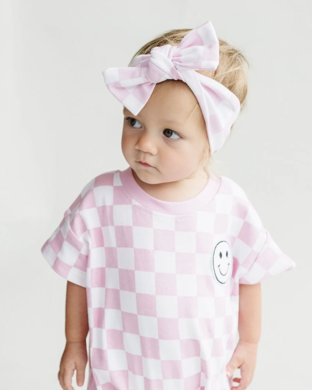 LPK Short Sleeve Bubble Romper - Checkered Smiley Pink - Atara & Co